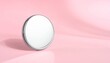 © Nisar Studio - Round Silver Mirror on Soft Pink Background – Minimalist Product Photography