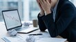 © Mutia - Professional facing overwhelming financial crisis and market downturn, showing immense distress at an office desk with a clear falling graph