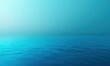 © letter - calm blue ocean with gentle ripples and a soft gradient sky, evoking peaceful serenity