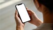 © Sharma - Woman holding smartphone with blank white screen mockup,close up mobile display for app design,online shopping,social media and digital marketing concept