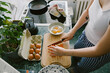 © ISO DUO/Stocksy - Top-Down View of Hands Chopping Bell Pepper for Breakfast