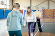 © Luciano Spinelli/Stocksy - Young Women doing workout warm-up routine