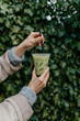 © luke + mallory leasure/Stocksy - Iced Matcha to go