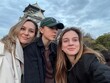 © Asya Molochkova/Stocksy - Friends Posing in Front of Osaka Castle at Sunset