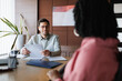 © DZ FILM/Stocksy - Business meeting in the office