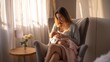 © Busayo - A young woman breastfeeding a newborn baby