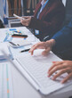 © Sutthicha - Accounting company provide finance and taxation planning for profitable cash flow, Auditor and accountant team working in office, analyze financial data and accounting record with calculator