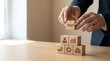 © Home StudioX - Trust Concept Businessperson Stacking Wooden Blocks with Business Icons in Office for Partnership Strategy