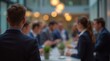 © Alex Pios - Blurred shot of business people at party or corporate event in office center