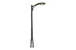 © Alan - A modern street lamp post with a curved arm and a circular light fixture stands isolated against a solid black background. The pole has a textured dark grey finish.