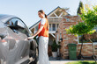 © DZ FILM/Stocksy - The woman gets into the car
