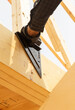 © Raymond Forbes LLC/Stocksy - Construction Site speed square tool measure