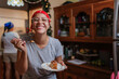 © Leonardo Borges/Stocksy - Happy woman eating flan