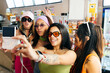 © Mal de Ojo Studio/Stocksy - Friends Taking a Fun Selfie Together
