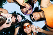 © Mal de Ojo Studio/Stocksy - Friends Taking Fun Photos Outdoors