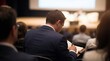 © ViskBx - Business professional taking notes at a conference or seminar