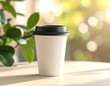 © akalav - Minimalist White Coffee Cup with Black Lid in Natural Sunlight