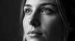 © Donnangelo - A close-up black and white portrait of a beautiful young woman with a contemplative expression