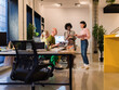 © Milles Team/Stocksy - Team Meeting in a Modern Office Discussing a Project Together