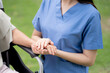 © NT_studio - Close up nurse holding hand senior patient for encourage, assistance and support, caregiver touch hand elderly woman with empathy and comfort, rehabilitation therapy mental health for elderly.