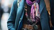 © Irina - A fashion enthusiast showcases their unique style with a vibrant scarf and layered necklaces. The bustling city backdrop blends modernity and creativity, highlighting individuality