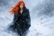 © Oleg - a girl with red hair and a black cloak in a snowstorm