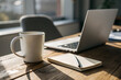 © Alina - Blank ceramic mug mockup on wooden table near laptop and notebook. Warm sunlight workspace scene ideal for branding, logo placement and print design preview.