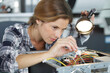 © auremar - female technician working with transistor