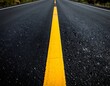 © Supra - A long, straight road with a yellow line down the center