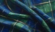 © hut - A close-up view of a fabric with blue, green, and gold plaid pattern