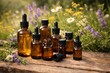 © Alamin - Essential oil bottles on wooden surface with lavender and chamomile flowers in meadow sun
