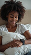 © AlenaSi - Relaxed woman with smartwatch on bed, resting comfortably with pillow in embrace. Woman enjoys peaceful moments with technology, smiling softly at time.