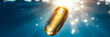 © plysuikvv - Golden fish oil capsule floats in clear water Generative AI