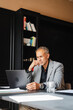 © Nuria Seguí/Stocksy - Man using a laptop