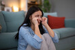 © Dexon Dee - Young woman suffering from depression crying at home