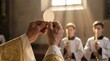 © AlfaSmart - Senior man priest hands holding communion wafer during catholic mass. Religious ceremony and sacrament concept Christian church ritual.