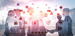 © InfiniteFlow - Collaborative Partnership: Business Team Shaking Hands Over City Skyline with Social Media Icons and Digital Analytics Elements Quark.