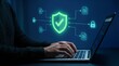 © Matos - Person working on laptop digital security shield and data protection concept