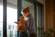 © Artcore Studio/Stocksy - Businesswomen collaborating on tablet