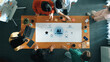 © InfiniteFlow - A dynamic workspace where diverse professionals engage in discussions about AI-driven e-learning strategies, showcasing collaboration, innovation, and digital transformation. Trope