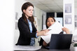 © DC Studio - Diverse female professionals looking at 3d building model, cross checking with client requirements on laptop. Asian and caucasian architects analyzing prototype in office for new construction project.