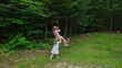 © Erik Naumann/Stocksy - Two girls play on a zipline