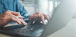 © Garun Studios - Business professional using laptop with virtual live chat interface, representing customer support, online assistance, CRM communication, automated response system, and digital service management.