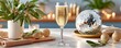 © Fat Bee - New Year celebration scene with champagne glass, disco ball, and festive decor on an elegant white table