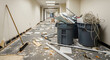 © akridiy - Construction debris and trash bins in messy office corridor renovation