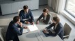 © Dewi Hafni Rezeki - Business professionals gathered around a table in a modern office, signing documents and discussing strategies from a high vantage point