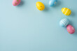 © ActionGP - Happy Easter greeting featuring pastel decorated eggs on a soft blue background for spring celebration and seasonal decoration