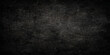 © NOT BAD - Dark aged concrete wall background with a rough black stone texture and vintage gray paper pattern for a dirty grunge design backdrop