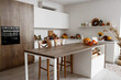 © Pixel-Shot - Interior of light kitchen with pumpkins, berries and autumn decorations