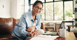 © OnPoint/peopleimages.com - Woman, finance or calculator with laptop in home for budget planning, bills or expenses. Female person, accounting or checklist with documents on sofa for financial audit or asset management in house